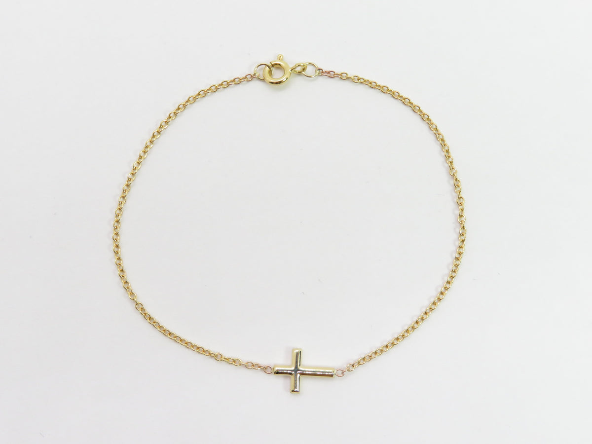 Yellow gold hot sale cross bracelet